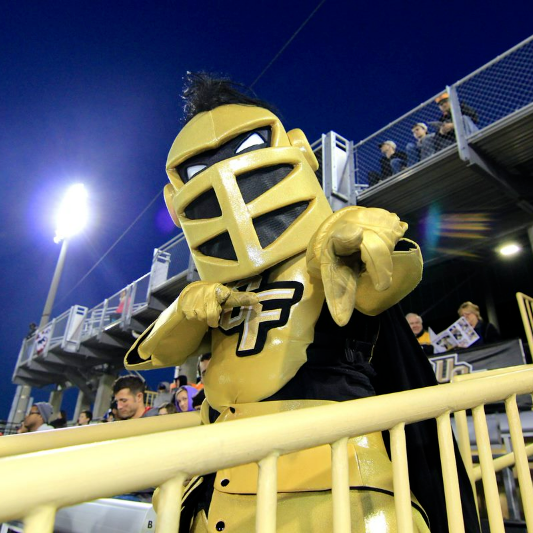 Knightro pointing at the camera.