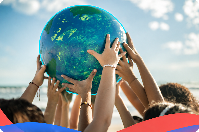 Hands lifting a globe together